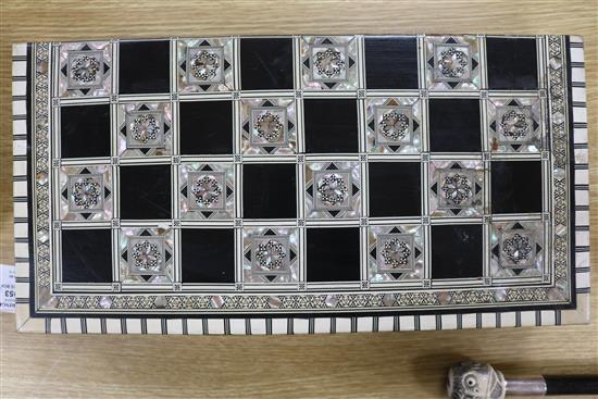 An Indian mother of pearl and bone chess/backgammon games box with horn and bone counters width 42cm depth 21cm